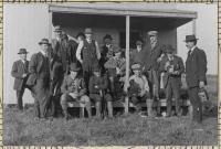 Portland Camera Club members pose with cameras, ca. 1900