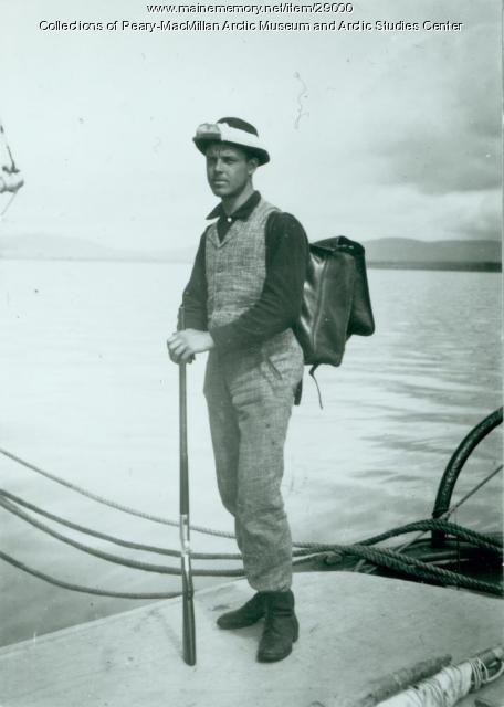 Ernest Young leaning on rifle, Labrador, 1891